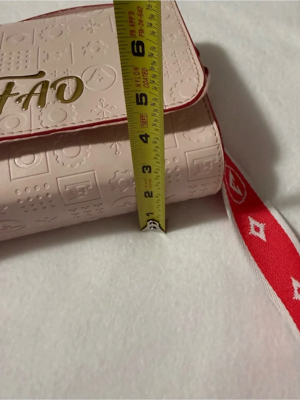 FAO Schwarz Blush Pink Embossed Crossbody Bag Red Strap Frog Hand Puppet